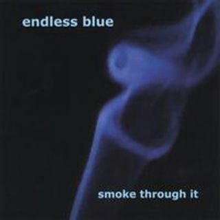 A small tendril of blue cigarette smoke on a black background.