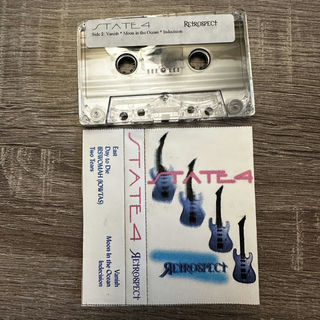 A cassette tape and case with a slowly forming guitar.